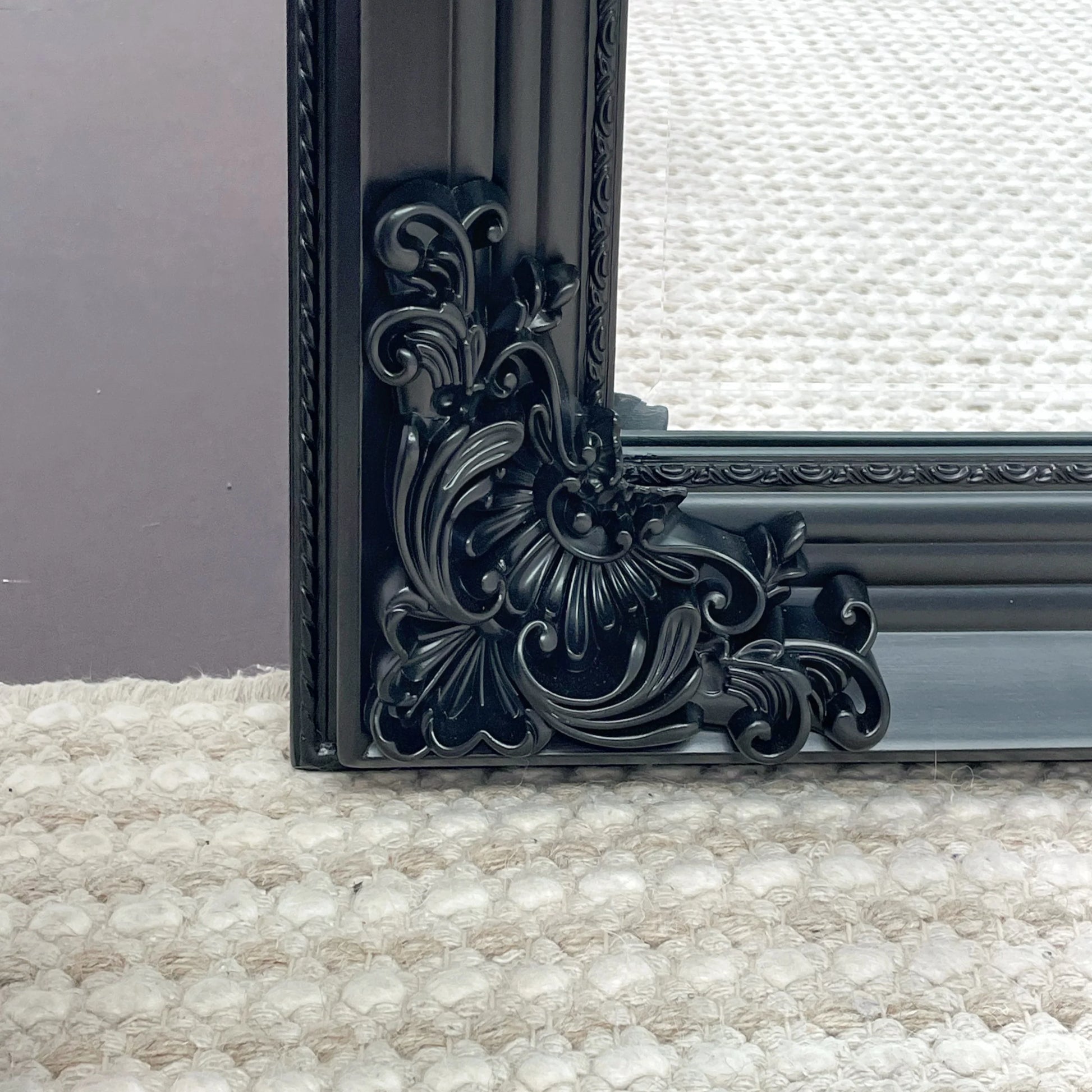 French Vienna black wooden mirror measuring 220cm by 110cm.