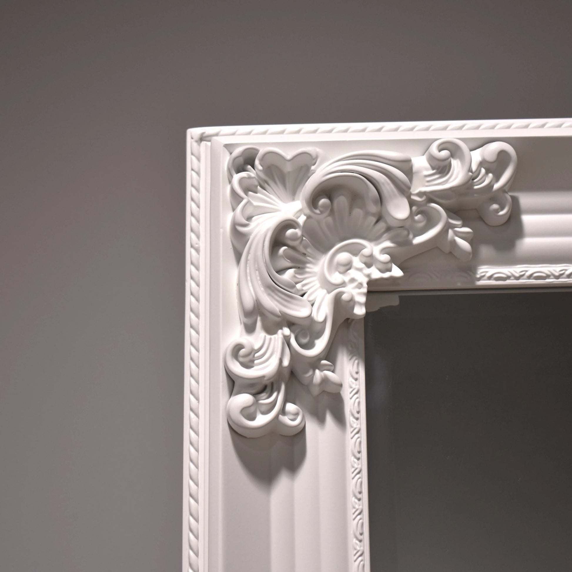 French Vienna wall mirror with an elegant white wooden frame